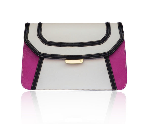Color-blocked cream, black, and fuchsia textured leather clutch with gold-tone hardware and a chic designer logo plaque.