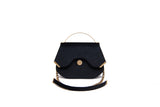 Black velvet Calypso top handle bag with gold-tone hardware, designer logo, and a detachable chain strap, 23cm wide.