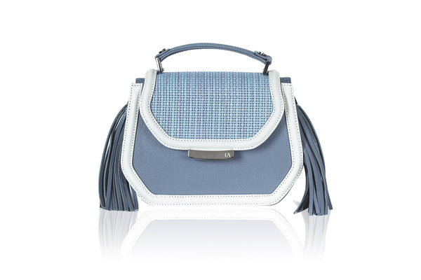Blue Anabella mini tote in textured raffia and calf leather with silver logo, side tassels, and a chic structured design.