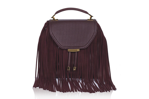 Bordeaux medium satchel featuring weaved calf leather, suede fringe, and elegant gold-tone hardware.