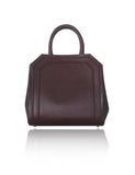 Bordeaux medium trapeze tote in textured calf leather with raffia sides, gold-tone hardware, and elegant top handles.