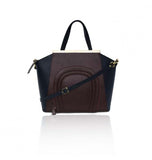 Bordeaux and navy smooth leather Sharon tote featuring a front pocket, gold-plated plaque, and detachable shoulder strap.