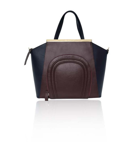Bordeaux and navy smooth leather Sharon tote featuring a front pocket, gold-plated plaque, and structured silhouette.
