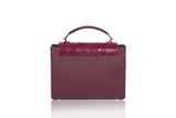 Bordeaux Steffany top handle bag in textured calf leather with a meshed water snake flap and elegant gold-tone hardware.