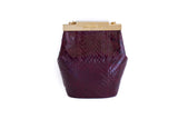 Bordeaux watersnake mini bucket bag featuring a sleek gold-tone clasp and luxurious textured exotic skin finish.