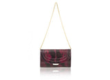 Cherry red and black python skin clutch with gold-tone hardware, detachable chain, and elegant flap closure.