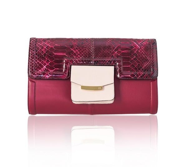 Cherry red lamb leather Serena clutch with python flap, powder pink pocket, and elegant gold-tone logo hardware.