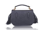 Mini Anabella bag in black calf leather with side tassels, cream flap, and gold-tone hardware in a compact 14cm design.