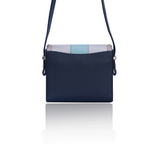 Navy leather Anya crossbody bag with cream, mint, and pink accents, silver hardware, and a sleek 18cm compact design.