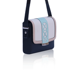 Cream and navy leather Anya crossbody bag with mint laser-cut trim, powder pink borders, and elegant silver-tone hardware.