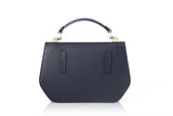 Mini Anabella tote in navy and cream calf leather with a structured silhouette, top handle, and gold-tone hardware accents.