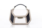 Mini Anabella tote in cream and navy calf leather with a metallic finish, gold-tone logo plaque, and structured top handle.