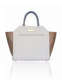 Structured cream and sand textured leather Sharon tote with teal blue handles, gold hardware, and a designer logo plaque.