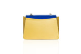 Mini Jackie O bag in mustard calf leather and electric blue lizard flap with silver chain and cream side compartment.