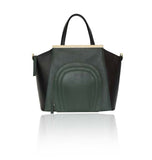 Emerald green and black smooth leather trapeze tote with a front zip pocket and elegant gold designer plaque.