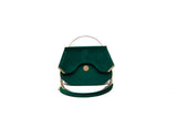 Emerald green velvet Calypso top handle bag featuring gold-tone hardware, a designer logo, and a detachable chain strap.