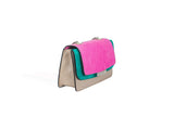 Mini Jackie O shoulder bag in greige calf leather with a perforated fuchsia nubuck flap, jade suede trim, and silver logo.