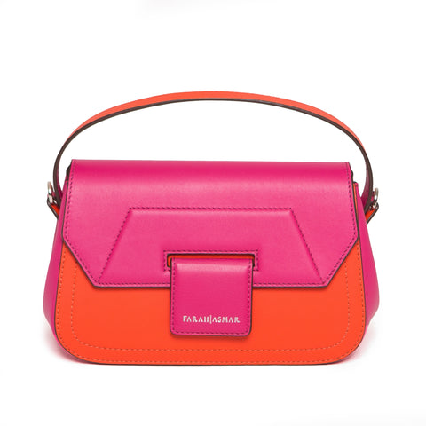 Fuchsia and blood orange smooth Napa leather shoulder bag with silver hardware and a structured flap design.