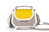 Mini Anabella bag in mustard and greige calf leather with side tassels, silver logo plaque, and detachable chain strap.