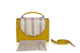 Mustard textured leather Steffany top handle bag with pale yellow snakeskin flap, beige suede fringe, and shoulder strap.
