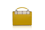 Mustard textured calf leather handbag with a pale yellow water snake flap, silver hardware, and chic top handle design.
