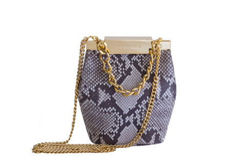 Natural beige python skin Valerie mini bucket bag with gold-tone hardware, designer logo clasp, and detachable chain strap.
