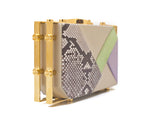 Geometric Linda clutch in multi-color calf leather and natural python skin with luxe gold-tone hardware and designer clasp.