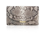 Natural black and white python skin clutch with gold-tone hardware and an elegant, compact 18cm design.