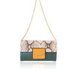 Serena clutch in dark green lamb leather with a natural python flap, orange pocket, and elegant gold-tone chain strap.