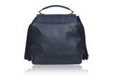 Navy Becky medium satchel in textured calf leather with a weaved flap, suede fringe details, and elegant gold-tone hardware.