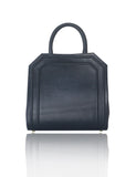 Navy textured leather Sharon tote with raffia-effect sides, gold-tone hardware, and elegant carry handles.