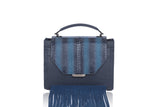 Navy Steffany top handle bag in textured calf leather with a meshed water snake flap, suede fringes, and silver hardware.