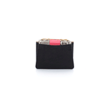 Jackie O shoulder bag in black textured leather with a python flap, pink laser-cut detail, and gold chain strap.