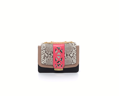 Jackie O shoulder bag in nude and black leather with a python flap, pink laser-cut detail, and gold chain strap.