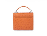 Papaya orange mini Steffany tote in textured ostrich leather with silver-tone hardware and a structured top handle.