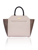 Powder pink and taupe textured leather Sharon trapeze tote with black handles and gold-tone logo plaque.