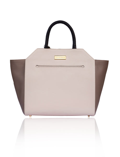 Powder pink and taupe textured leather Sharon trapeze tote with black handles and gold-tone logo plaque.
