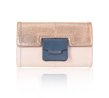 Serena clutch in powder pink lamb leather with a rose gold python flap, storm blue pocket, and gunmetal logo plaque.