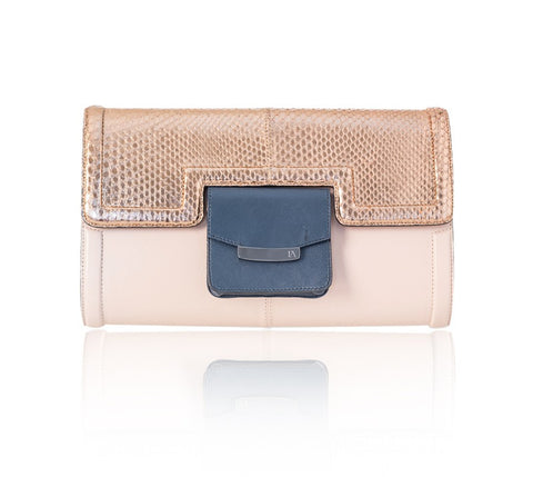 Serena clutch in powder pink lamb leather with a rose gold python flap, storm blue pocket, and gunmetal logo plaque.