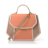 Structured salmon and nude leather Anabella tote with gold-tone logo, top handle, and detachable shoulder strap.