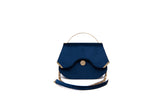Sapphire blue velvet Calypso mini tote featuring a sleek gold-tone handle, matching chain strap, and elegant designer logo.