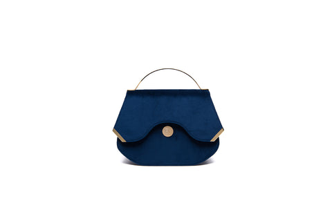 Sapphire blue velvet Calypso mini tote featuring a sleek top handle, gold-tone hardware, and elegant designer logo detailing.