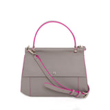 Stone Gray smooth Napa leather Nora top handle bag with vibrant fuchsia edge paint and sleek silver-tone hardware.