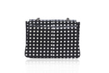 Mini Jackie O shoulder bag in monochrome water snake leather with a chic checkered pattern and silver-tone chain strap.