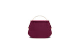 Wine red velvet Calypso top handle bag featuring a structured silhouette, elegant gold-tone hardware, and a chic arched handle.